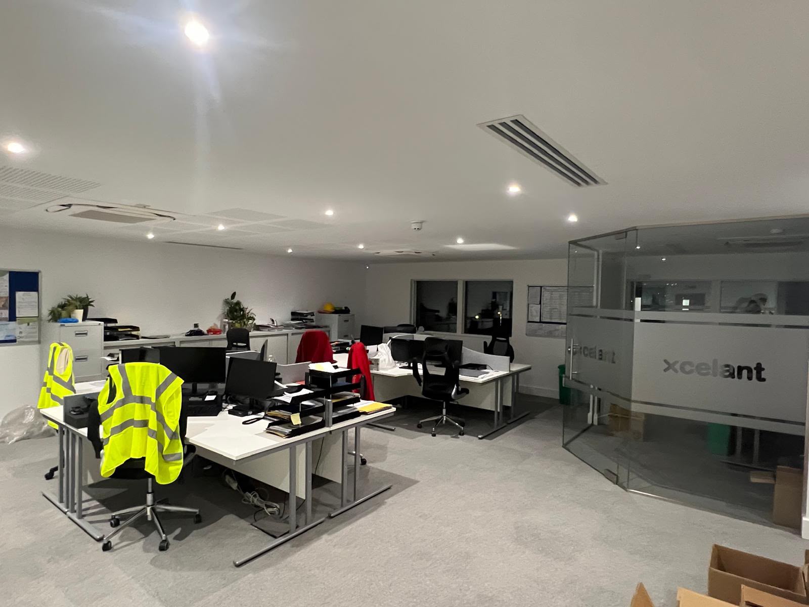 Open-plan Kent office with evenly spaced recessed lighting