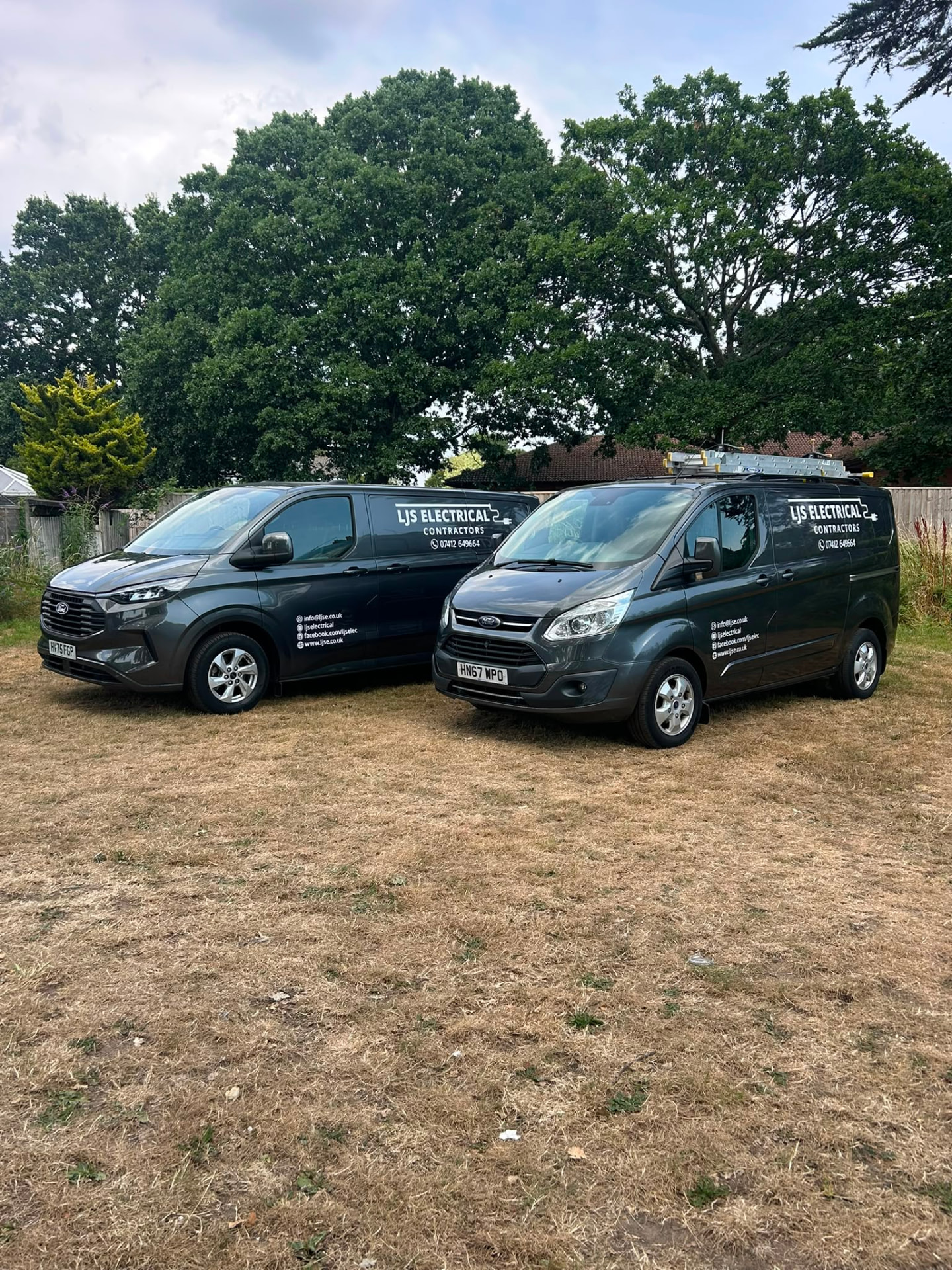 Two LJS Electrical Contractors Ltd branded vans